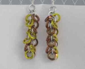 Anodized aluminum rings from square wire colors: bronze and gold weave: shaggy loops size: 1  1/2